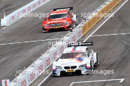 Sunday Round of 16 Martin Tomczyk (GER) BMW Team RMG BMW M3 DTM against Robert Wickens (CAN) Mucke Motorsport AMG Mercedes C-Coupe 15.07.2012. DTM Showevent, Sunday, Muenchen, Germany