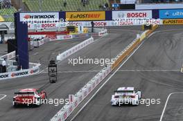 Sunday Round of 16 Martin Tomczyk (GER) BMW Team RMG BMW M3 DTM against Robert Wickens (CAN) Mucke Motorsport AMG Mercedes C-Coupe 15.07.2012. DTM Showevent, Sunday, Muenchen, Germany