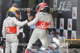 Lewis Hamilton (GBR), McLaren Mercedes with Jenson Button (GBR), McLaren Mercedes  18.03.2012. Formula 1 World Championship, Rd 1, Australian Grand Prix, Melbourne, Australia, Sunday