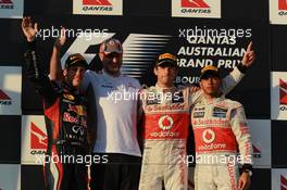 2nd place Sebastian Vettel (GER), Red Bull Racing with 1st place Jenson Button (GBR), McLaren Mercedes and 3rd place Lewis Hamilton (GBR), McLaren Mercedes  18.03.2012. Formula 1 World Championship, Rd 1, Australian Grand Prix, Melbourne, Australia, Sunday