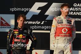 Sebastian Vettel (GER), Red Bull Racing with 1st place Jenson Button (GBR), McLaren Mercedes  18.03.2012. Formula 1 World Championship, Rd 1, Australian Grand Prix, Melbourne, Australia, Sunday