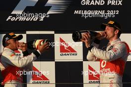 Lewis Hamilton (GBR), McLaren Mercedes with Jenson Button (GBR), McLaren Mercedes  18.03.2012. Formula 1 World Championship, Rd 1, Australian Grand Prix, Melbourne, Australia, Sunday