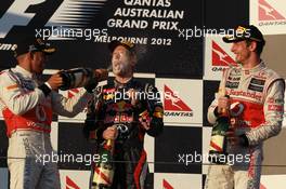 Lewis Hamilton (GBR), McLaren Mercedes with Sebastian Vettel (GER), Red Bull Racing and 1st place Jenson Button (GBR), McLaren Mercedes  18.03.2012. Formula 1 World Championship, Rd 1, Australian Grand Prix, Melbourne, Australia, Sunday