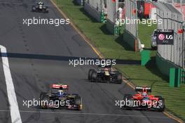 Jean-Eric Vergne (FRA), Scuderia Toro Rosso and Timo Glock (GER), Marussia F1 Team  18.03.2012. Formula 1 World Championship, Rd 1, Australian Grand Prix, Melbourne, Australia, Sunday