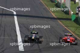 Vitaly Petrov (RUS), Caterham F1 Team and Charles Pic (FRA), Marussia F1 Team  18.03.2012. Formula 1 World Championship, Rd 1, Australian Grand Prix, Melbourne, Australia, Sunday