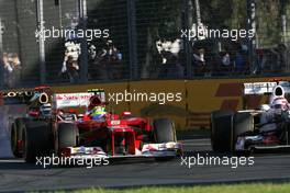 Felipe Massa (BRA), Scuderia Ferrari and Kamui Kobayashi (JAP), Sauber F1 Team  18.03.2012. Formula 1 World Championship, Rd 1, Australian Grand Prix, Melbourne, Australia, Sunday