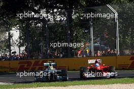 Nico Rosberg (GER), Mercedes GP and Fernando Alonso (ESP), Scuderia Ferrari  18.03.2012. Formula 1 World Championship, Rd 1, Australian Grand Prix, Melbourne, Australia, Sunday