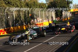 Nico Rosberg (GER), Mercedes GP and Mark Webber (AUS), Red Bull Racing  18.03.2012. Formula 1 World Championship, Rd 1, Australian Grand Prix, Melbourne, Australia, Sunday