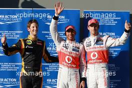 Qualifying results, 3rd Romain Grosjean (FRA), Lotus Renault F1 Team with 1st place Lewis Hamilton (GBR), McLaren Mercedes and 2nd place Jenson Button (GBR), McLaren Mercedes  17.03.2012. Formula 1 World Championship, Rd 1, Australian Grand Prix, Melbourne, Australia, Saturday