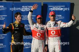 Romain Grosjean (FRA), Lotus F1 Team, Lewis Hamilton (GBR), McLaren Mercedes and Jenson Button (GBR), McLaren Mercedes  17.03.2012. Formula 1 World Championship, Rd 1, Australian Grand Prix, Melbourne, Australia, Saturday