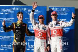 Qualifying results, 3rd Romain Grosjean (FRA), Lotus Renault F1 Team with 1st place Lewis Hamilton (GBR), McLaren Mercedes and 2nd place Jenson Button (GBR), McLaren Mercedes  17.03.2012. Formula 1 World Championship, Rd 1, Australian Grand Prix, Melbourne, Australia, Saturday
