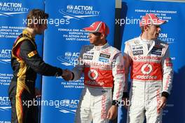 Qualifying results, 3rd Romain Grosjean (FRA), Lotus Renault F1 Team with 1st place Lewis Hamilton (GBR), McLaren Mercedes and 2nd place Jenson Button (GBR), McLaren Mercedes  17.03.2012. Formula 1 World Championship, Rd 1, Australian Grand Prix, Melbourne, Australia, Saturday