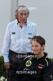 Sir Jackie Stewart with Romain Grosjean (FRA), Lotus Renault F1 Team  18.03.2012. Formula 1 World Championship, Rd 1, Australian Grand Prix, Melbourne, Australia, Sunday