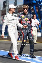Michael Schumacher (GER), Mercedes AMG Petronas and Sebastian Vettel (GER), Red Bull Racing  18.03.2012. Formula 1 World Championship, Rd 1, Australian Grand Prix, Melbourne, Australia, Sunday