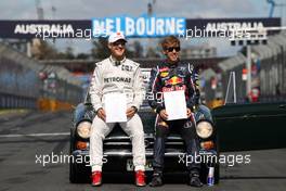 Michael Schumacher (GER), Mercedes GP and Sebastian Vettel (GER), Red Bull Racing  18.03.2012. Formula 1 World Championship, Rd 1, Australian Grand Prix, Melbourne, Australia, Sunday