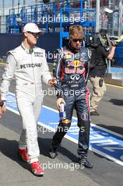 Michael Schumacher (GER), Mercedes AMG Petronas and Sebastian Vettel (GER), Red Bull Racing  18.03.2012. Formula 1 World Championship, Rd 1, Australian Grand Prix, Melbourne, Australia, Sunday