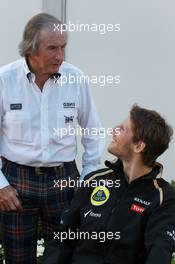 Sir Jackie Stewart with Romain Grosjean (FRA), Lotus Renault F1 Team  18.03.2012. Formula 1 World Championship, Rd 1, Australian Grand Prix, Melbourne, Australia, Sunday