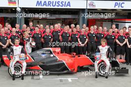 Marussia team photo with Timo Glock (GER), Marussia F1 Team and Charles Pic (FRA), Marussia F1 Team  18.03.2012. Formula 1 World Championship, Rd 1, Australian Grand Prix, Melbourne, Australia, Sunday