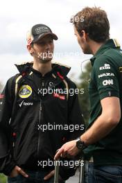 Romain Grosjean (FRA), Lotus F1 Team and Giedo van der Garde (NEL), Caterham F1 Team  15.03.2012. Formula 1 World Championship, Rd 1, Australian Grand Prix, Melbourne, Australia, Thursday