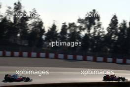 23.02.2012, Barcelona, Spain, Mark Webber (AUS), Red Bull Racing and Jenson Button (GBR), McLaren Mercedes   - Formula 1 Testing, day 3 - Formula 1 World Championship