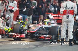 02.04.2012, Barcelona, Spain, Lewis Hamilton (GBR), McLaren Mercedes pit stop practice goes a bit wong when a wheel gun gets stuck and Lewis tries to drive on - Formula 1 Testing, day 2 - Formula 1 World Championship