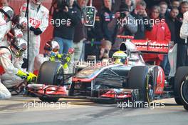 02.04.2012, Barcelona, Spain, Lewis Hamilton (GBR), McLaren Mercedes pit stop practice goes a bit wong when a wheel gun gets stuck and Lewis tries to drive on - Formula 1 Testing, day 2 - Formula 1 World Championship