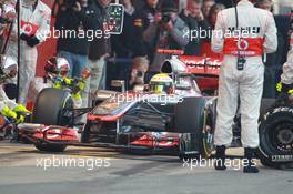 02.04.2012, Barcelona, Spain, Lewis Hamilton (GBR), McLaren Mercedes pit stop practice goes a bit wong when a wheel gun gets stuck and Lewis tries to drive on - Formula 1 Testing, day 2 - Formula 1 World Championship