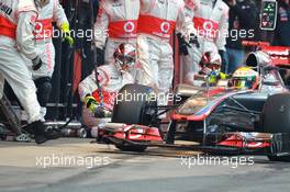 02.04.2012, Barcelona, Spain, Lewis Hamilton (GBR), McLaren Mercedes pit stop practice goes a bit wong when a wheel gun gets stuck and Lewis tries to drive on - Formula 1 Testing, day 2 - Formula 1 World Championship