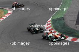 03.03.2012, Barcelona, Spain, Paul di Resta (GBR), Sahara Force India Formula One Team leads Heikki Kovalainen (FIN), Caterham F1 Team - Formula 1 Testing, day 3 - Formula 1 World Championship