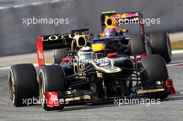 03.03.2012, Barcelona, Spain, Kimi Raikkonen, Lotus Renault F1 Team leads Mark Webber (AUS), Red Bull Racing - Formula 1 Testing, day 3 - Formula 1 World Championship