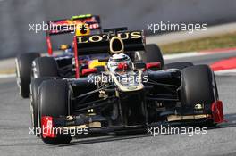 03.03.2012, Barcelona, Spain, Kimi Raikkonen, Lotus Renault F1 Team leads Mark Webber (AUS), Red Bull Racing - Formula 1 Testing, day 3 - Formula 1 World Championship