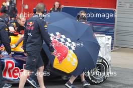 04.03.2012, Barcelona, Spain, Sebastian Vettel (GER), Red Bull Racing and the Red Bull mechanics try to hide his car - Formula 1 Testing, day 4 - Formula 1 World Championship