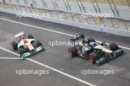 04.03.2012, Barcelona, Spain, Vitaly Petrov (RUS), Caterham F1 Team leads Nico Hulkenberg (GER), Sahara Force India Formula One Team - Formula 1 Testing, day 4 - Formula 1 World Championship