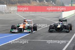 04.03.2012, Barcelona, Spain, Nico Hulkenberg (GER), Sahara Force India Formula One Team and Vitaly Petrov (RUS), Caterham F1 Team - Formula 1 Testing, day 4 - Formula 1 World Championship