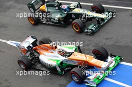 04.03.2012, Barcelona, Spain, Nico Hulkenberg (GER), Sahara Force India Formula One Team and Vitaly Petrov (RUS), Caterham F1 Team - Formula 1 Testing, day 4 - Formula 1 World Championship