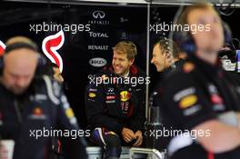 Sebastian Vettel (GER) Red Bull Racing with his mechanics. 31.08.2012. Formula 1 World Championship, Rd 12, Belgian Grand Prix, Spa Francorchamps, Belgium, Practice Day