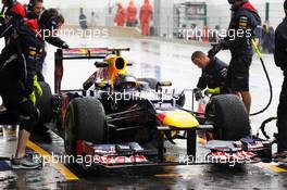 Mark Webber (AUS) Red Bull Racing RB8 practices a pit stop. 31.08.2012. Formula 1 World Championship, Rd 12, Belgian Grand Prix, Spa Francorchamps, Belgium, Practice Day