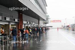 Heavy rain falls in the pit lane. 31.08.2012. Formula 1 World Championship, Rd 12, Belgian Grand Prix, Spa Francorchamps, Belgium, Practice Day