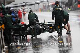 Heikki Kovalainen (FIN) Caterham CT01  pushed back in the pits. 31.08.2012. Formula 1 World Championship, Rd 12, Belgian Grand Prix, Spa Francorchamps, Belgium, Practice Day