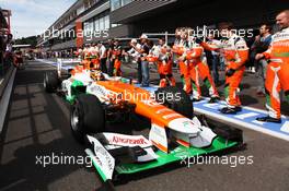 Nico Hulkenberg (GER) Sahara Force India F1 VJM05 celebrates his fourth position at the end of the race as he passes his team. 02.09.2012. Formula 1 World Championship, Rd 12, Belgian Grand Prix, Spa Francorchamps, Belgium, Race Day