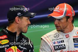 The FIA Press Conference (L to R): second placed Sebastian Vettel (GER) Red Bull Racing with Jenson Button (GBR) McLaren in the FIA Press Conference. 02.09.2012. Formula 1 World Championship, Rd 12, Belgian Grand Prix, Spa Francorchamps, Belgium, Race Day
