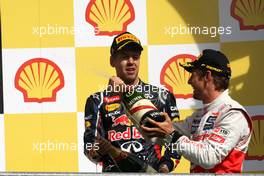 Sebastian Vettel (GER), Red Bull Racing and Jenson Button (GBR), McLaren Mercedes  02.09.2012. Formula 1 World Championship, Rd 12, Belgian Grand Prix, Spa Francorchamps, Belgium, Race Day