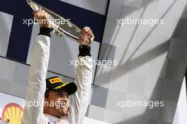 Race winner Jenson Button (GBR) McLaren celebrates on the podium. 02.09.2012. Formula 1 World Championship, Rd 12, Belgian Grand Prix, Spa Francorchamps, Belgium, Race Day