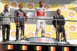 Podium, (l-r), Sebastian Vettel (GER), Red Bull Racing, Jenson Button (GBR), McLaren Mercedes and Kimi Raikkonen (FIN), Lotus F1 Team  02.09.2012. Formula 1 World Championship, Rd 12, Belgian Grand Prix, Spa Francorchamps, Belgium, Race Day