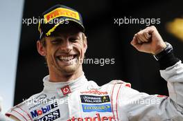 Race winner Jenson Button (GBR) McLaren celebrates on the podium. 02.09.2012. Formula 1 World Championship, Rd 12, Belgian Grand Prix, Spa Francorchamps, Belgium, Race Day