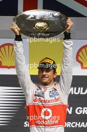 Race winner Jenson Button (GBR) McLaren celebrates on the podium. 02.09.2012. Formula 1 World Championship, Rd 12, Belgian Grand Prix, Spa Francorchamps, Belgium, Race Day