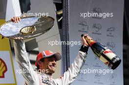 Race winner Jenson Button (GBR) McLaren celebrates on the podium. 02.09.2012. Formula 1 World Championship, Rd 12, Belgian Grand Prix, Spa Francorchamps, Belgium, Race Day