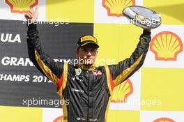 Kimi Raikkonen (FIN) Lotus F1 Team celebrates his third position on the podium. 02.09.2012. Formula 1 World Championship, Rd 12, Belgian Grand Prix, Spa Francorchamps, Belgium, Race Day