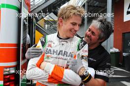 (L to R): Nico Hulkenberg (GER) Sahara Force India F1 celebrates his fourth position with Neil Dickie (GBR) Sahara Force India F1 Team. 02.09.2012. Formula 1 World Championship, Rd 12, Belgian Grand Prix, Spa Francorchamps, Belgium, Race Day