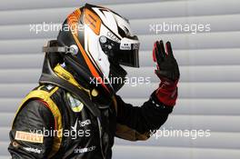Kimi Raikkonen (FIN) Lotus F1 Team celebrates his third position in parc ferme. 02.09.2012. Formula 1 World Championship, Rd 12, Belgian Grand Prix, Spa Francorchamps, Belgium, Race Day